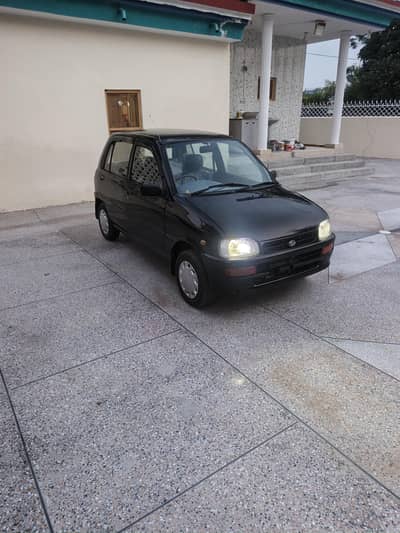 Daihatsu Cuore 2011 Black Islamabad number 61,000 km very good car