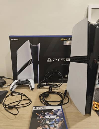 PS5 pro 2 controllers with disc drive with box 5games urgent sale