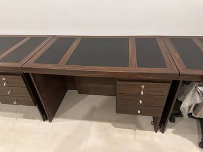 Number of Office tables 2. Top with leather looks in very good  as new