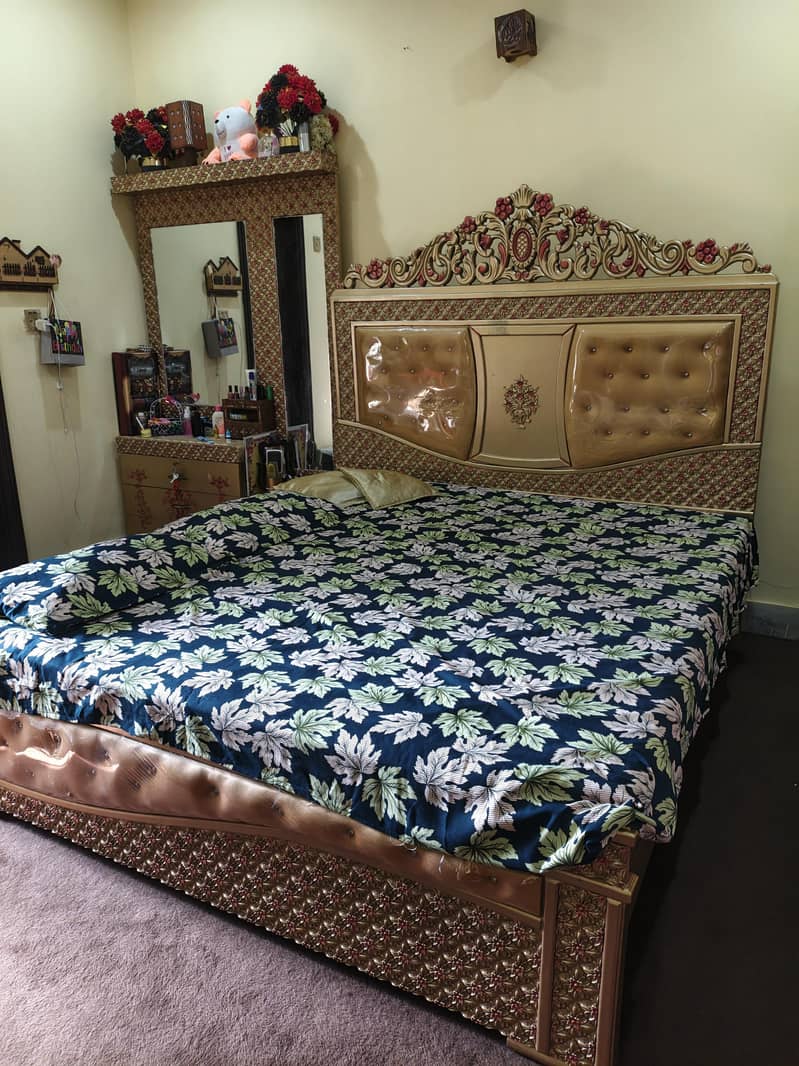 bed with side table, dressing table and showcase 0