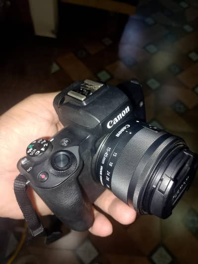 CANON EOS M50 WITH LENS AND 3 BATTIES