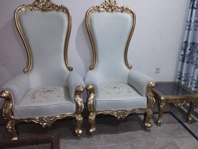 2 royal chairs with center table