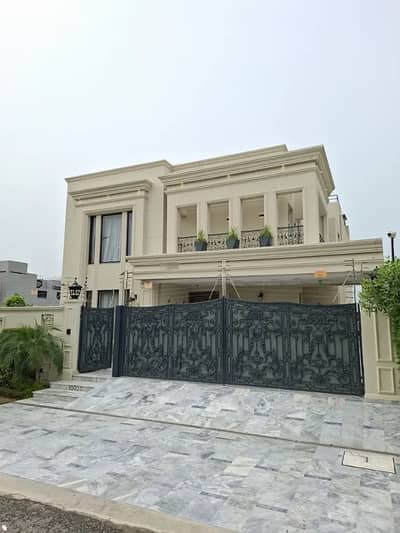 SYED BROTHERS PROUDLY OFFERS: 1-Kanal Elegant And Fully Furnihsed Classic Bungalow Near to Carefour Is Available In The Best Block Of DHA Lahore.