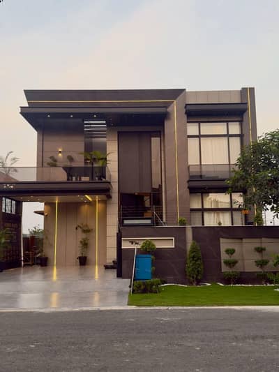 SYED BROTHERS PROUDLY OFFERS: 1-Kanal Elegant And Fully Furnihsed Modern Bungalow with SQs in Basement Is Available In The Best Block Of DHA Lahore.