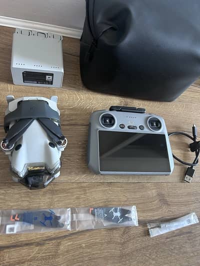 DJI Mini 4 Pro Fly More Combo Camera Drone + RC2 Controller