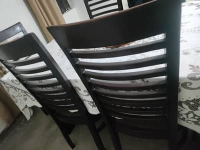 wooden dining table and chairs