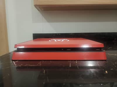 PLAYSTATION 4 SLIM WITH 2 CONTROLLERS AND 1 GAME ( Stray )