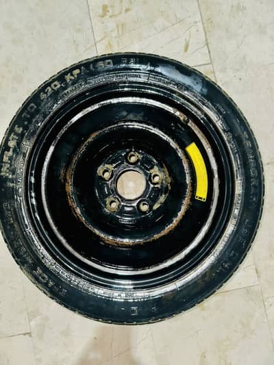 Japanese Dunlop stepney, spare tyre with rim. 135/80/16