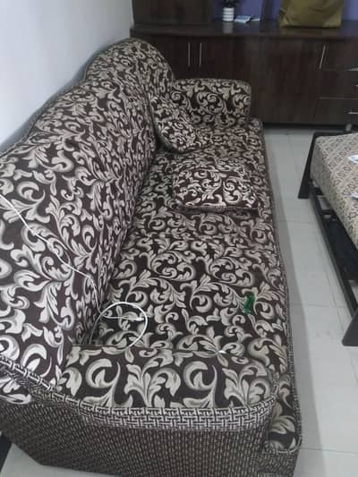 7 seater home used sofa and a table in good condition