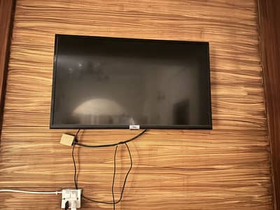 Two television one TCL and one Samsung