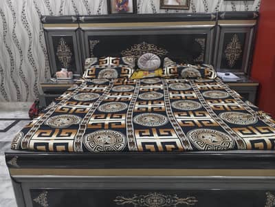 king size double bed with two side tables