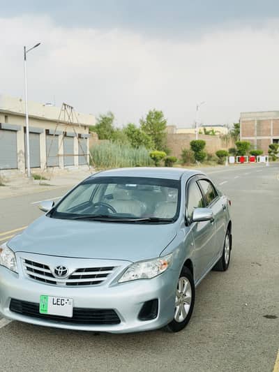 Toyota Corolla GLI 2013 model total genuine antique car 2 owner