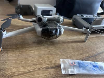 DJI Mini 4 Pro Fly More Combo Camera Drone + RC2 Controller