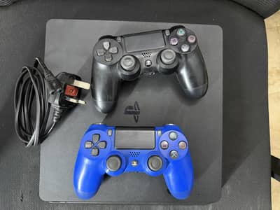 PlayStation 4 | PS4 slim 500 GB with 2 Controllers and 4 Games