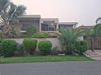 SYED BROTHERS PROUDLY OFFERS: 2-Kanal Elegant And Fully Maintained Bungalow With Basement & Facing Park Is Available In The Best Block Of DHA Lahore.