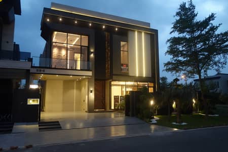 1 KANAL ELEGANT AND FULLY MAINTAINED SUPER HOT LOCATED BUNGALOW WITH SQs IN BASEMENT IS AVAILABLE IN THE BEST BLOCK OF DHA LAHORE.