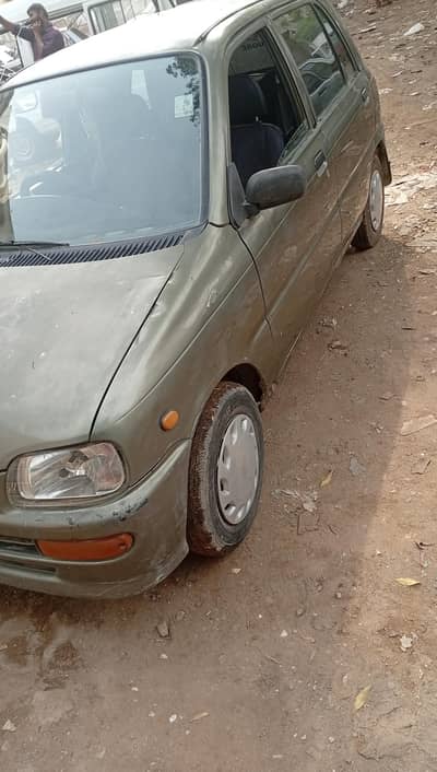 Daihatsu Cuore 2003 inside original outside shower