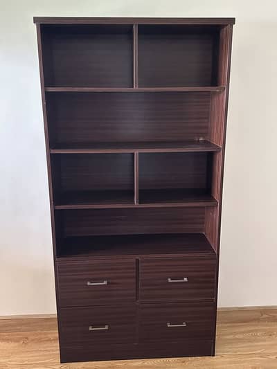 Multipurpose Shelf + 4 spacious drawers.