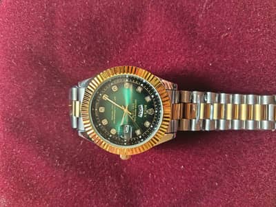 Green Rolex Day Date Watch