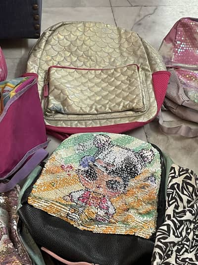 Preloved bags cartoonish bags glittery bags