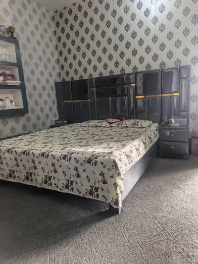 full king size bed side two tables