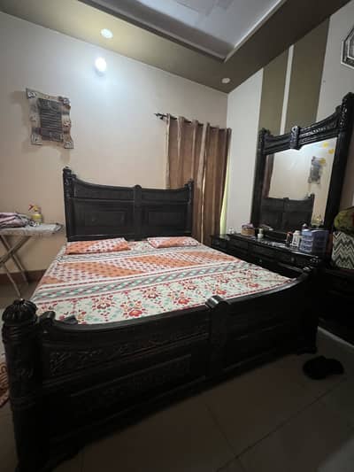 Bed with sides table and dressing