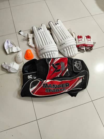 cricket pads and tennis rackets are for sale