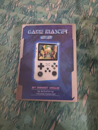 GAME MASTER R36S WITH 15,000 GAMES AND CHARGER AND  ONE POUCH