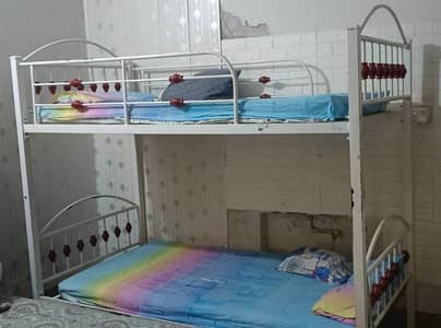 Selling this kids iron bunk bed