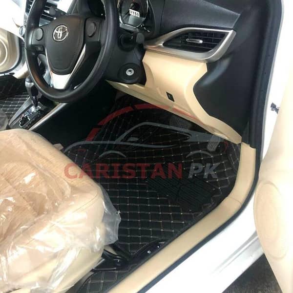 Toyota Yaris 7D Floor Mats in Black with Beige Stitching