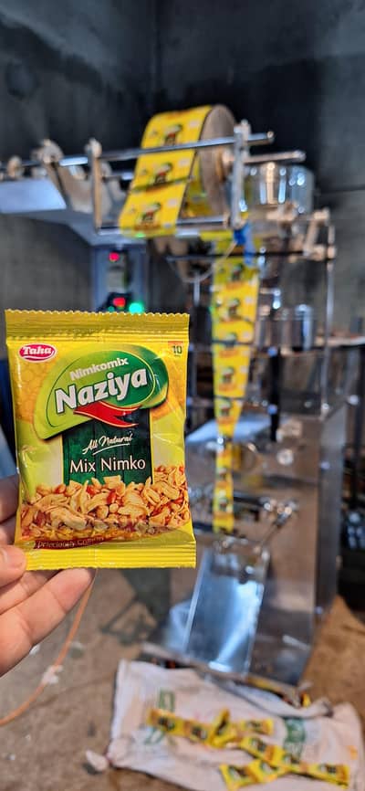 Nimko Chips Slanty Papar Packing Machine in Steel Model