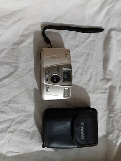 ​Original Canon Camera with Case - 10/10 Working Condition