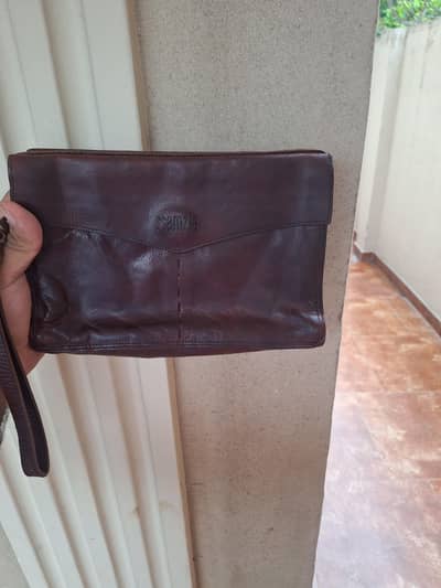 100% leather hand bag for sale.