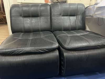 Two 1 seater sofas