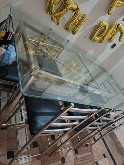 Steel Dining table almost 8 seater with 6 chairs