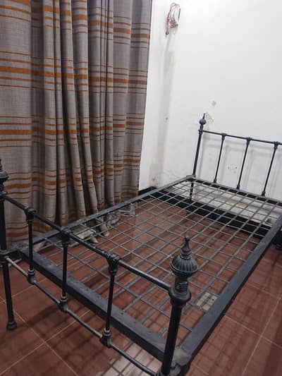 Rod iron vintage singel bed.