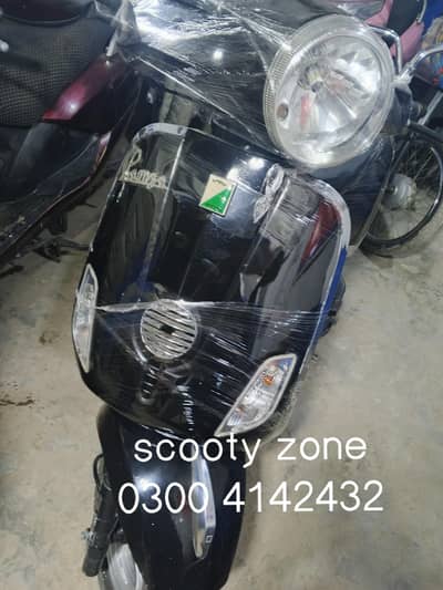 ramza 100cc fuel scooty   available  mob#03004142432