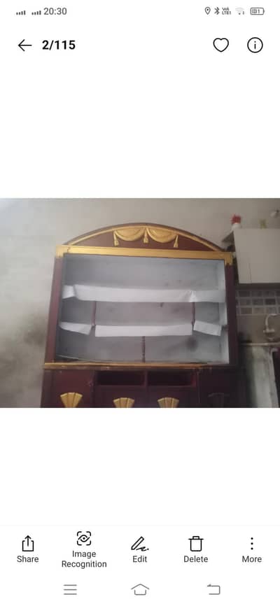 wooden crockri showcase and wooden dresser table with big mirror
