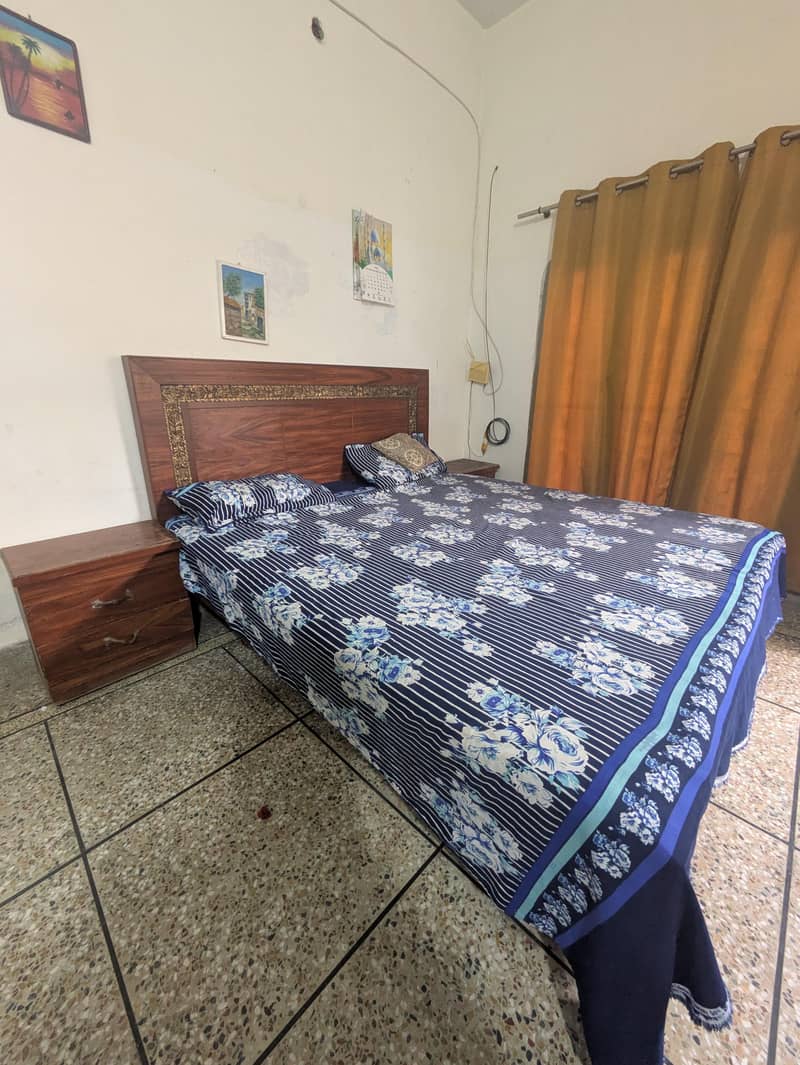 Double size bed and two side table 0
