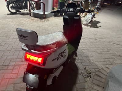 super star electric scooty