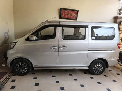 Pick and drop service in Faisalabad with latest model changan van
