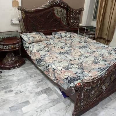 bed with side table and matress