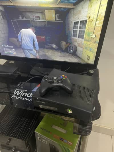 Xbox 360 Silm with one wireless controller & 40+ games installed