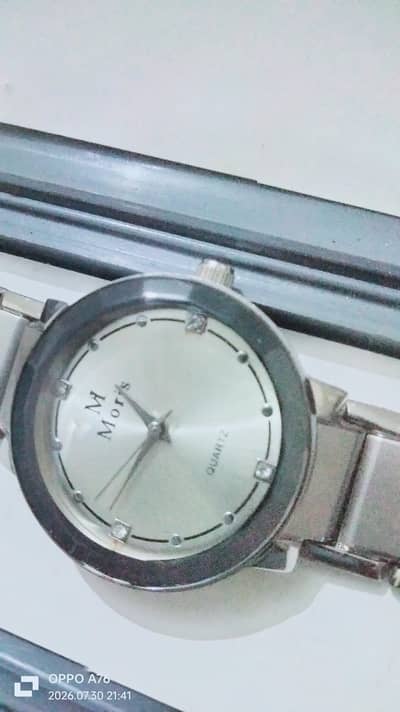 new and modern watch in silver colour