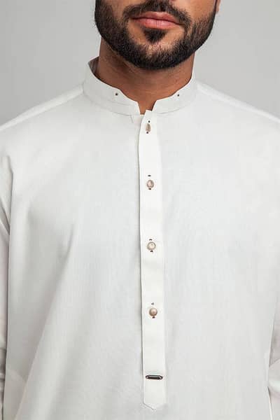 جینٹس سوٹ سلائ کیے جاتے ہے ہر قسم ڈیزائن کرتا گم سلائ