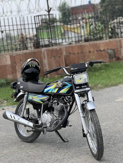 All paper clear Honda 125 black cour Honda name is Sultan