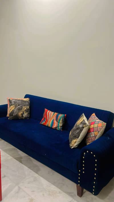 Three seater sofa cum bed