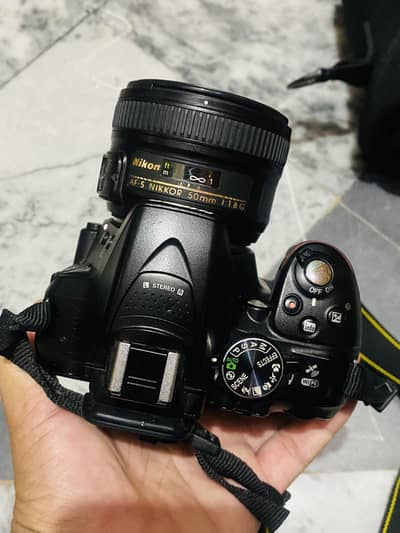 Nikon d5300 body with 50mm F1.8G Nikon prime lens and accessories.