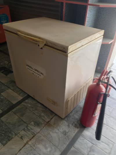 Chiller, chest freezer and fire extinguisher