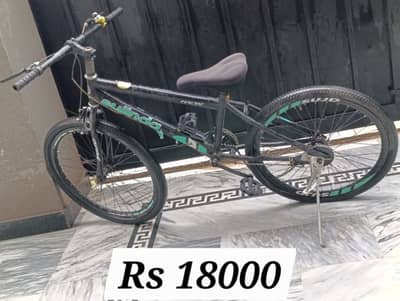 blue  gears bicycle  medium size  20inc and 22inc available on sale.
